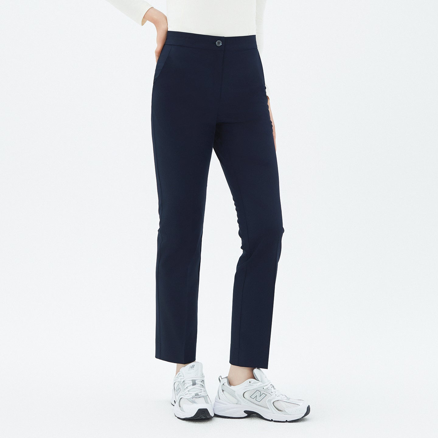 Front view of TUL Women’s Side Hidden Banding Pants in Mir Navy, featuring a button closure and hidden side band for added comfort.