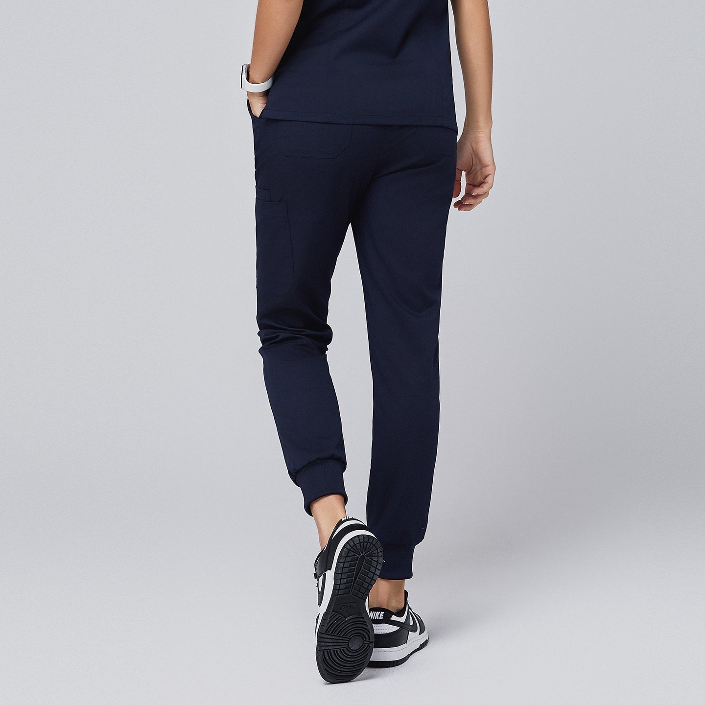 Stylish navy jogger scrub pants showcasing a sleek back design with practical pockets, perfect for modern healthcare professionals,Navy