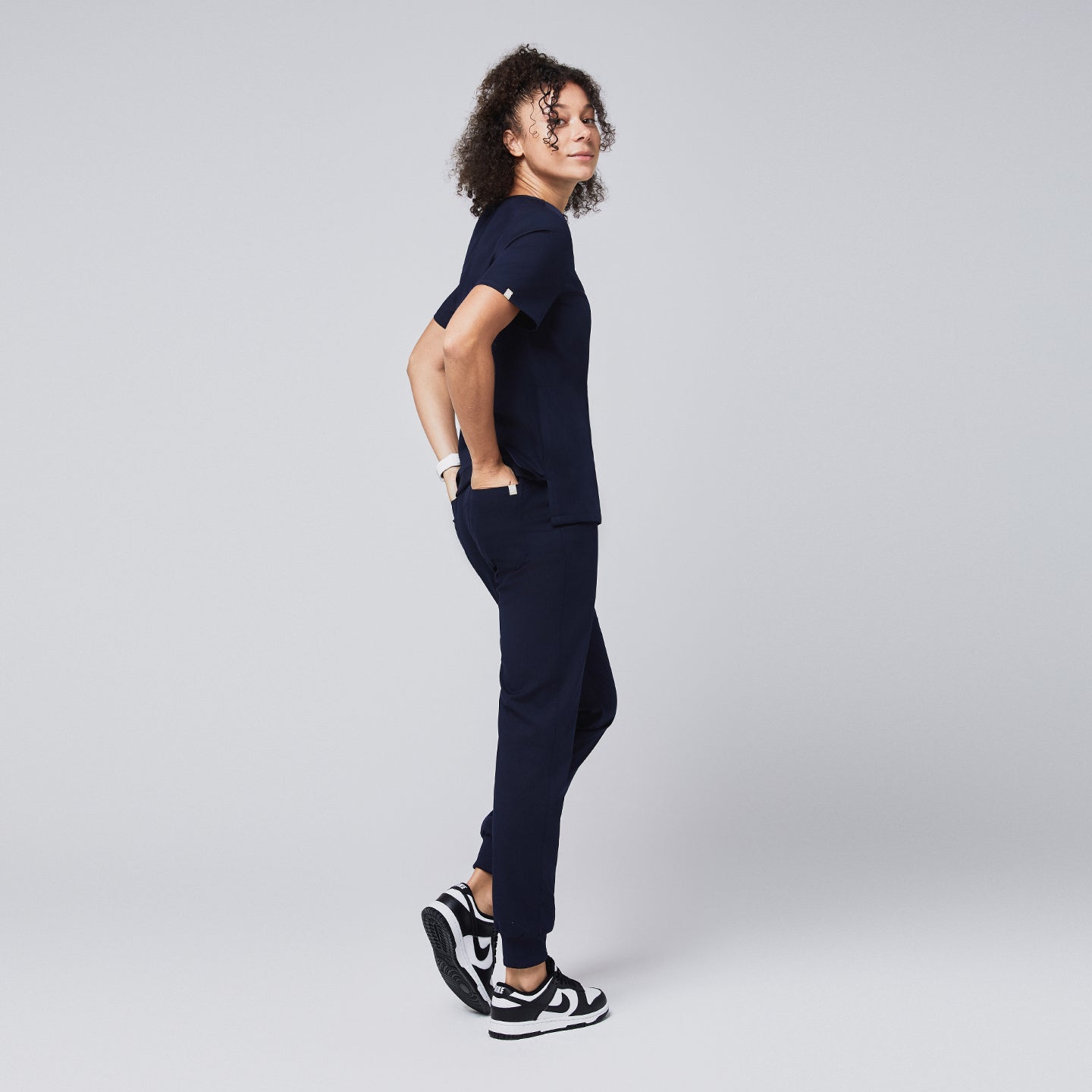 Professional navy scrub joggers styled for comfort and mobility, paired with a sleek matching top, perfect for active work environments,Navy