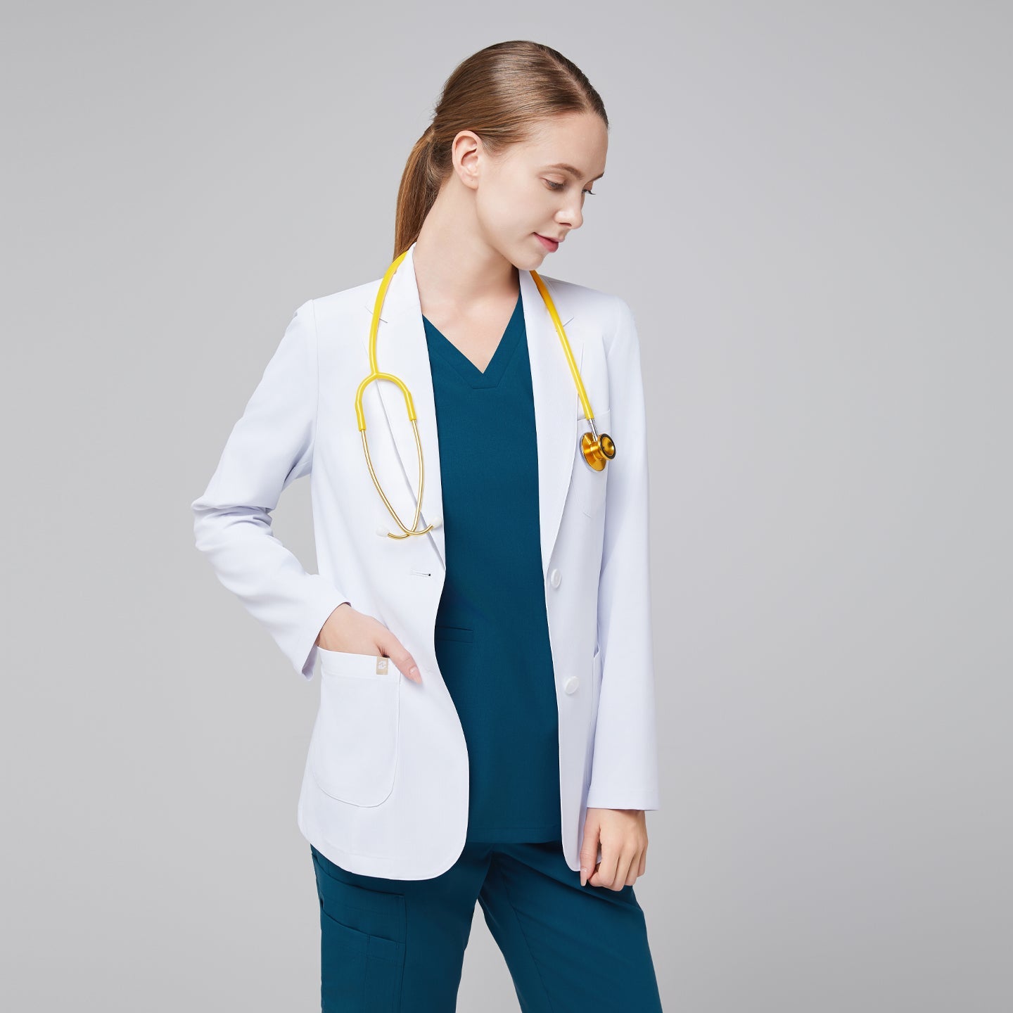 Bright white lab coat LCW-02, model wearing with notched lapels and front pockets.