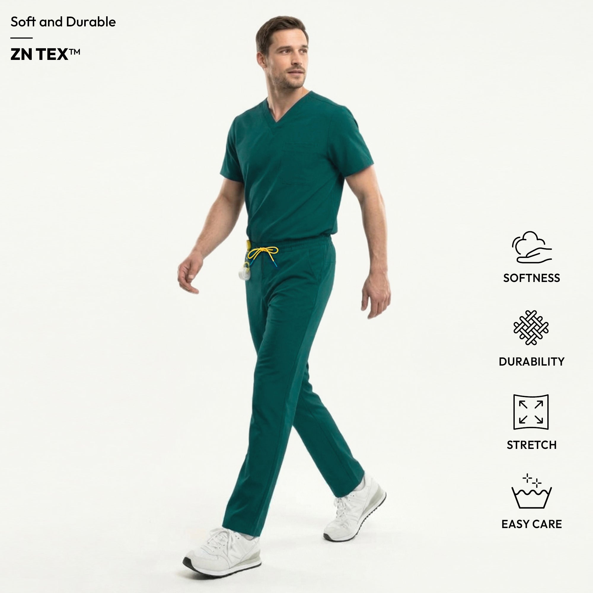 A walking model in Pine Green 3 Pocket Scrub Top strikes a dynamic pose with a focused expression.